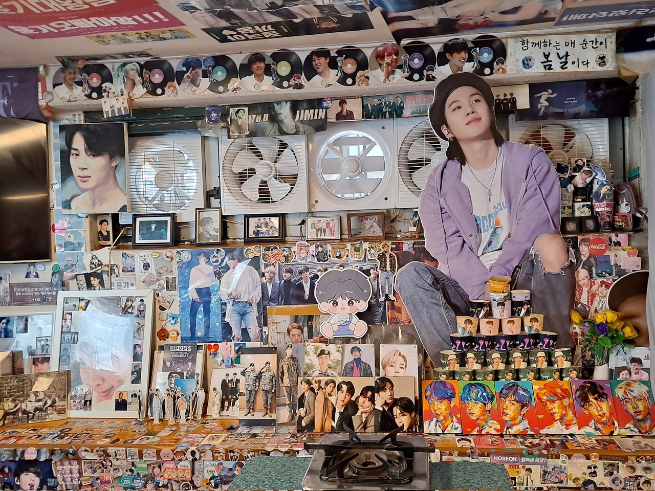 Posters and fan drawings of BTS are on display at Yoojung Sikdang in Gangnam-gu, southern Seoul. (Lee Jung-joo/The Korea Herald)