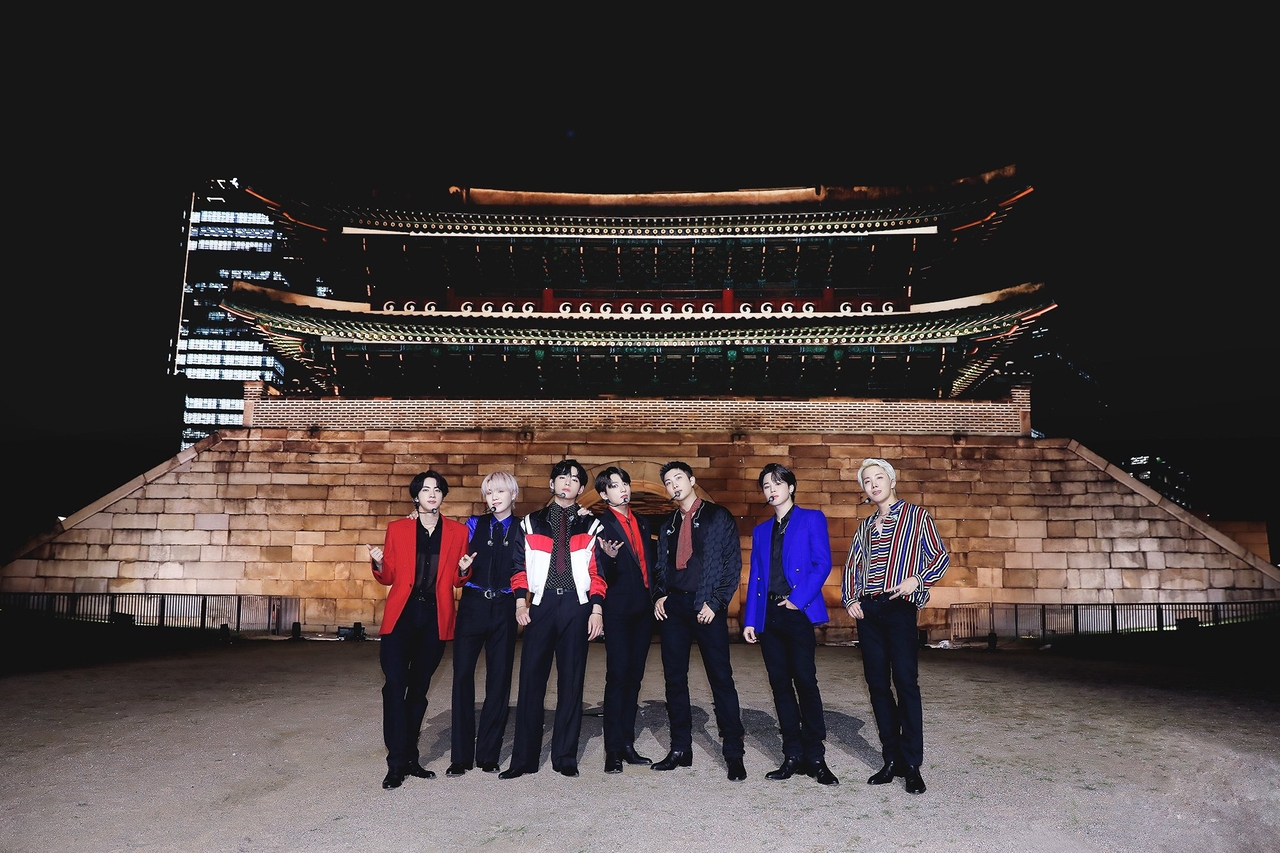 BTS poses in front of Sungnyemun ahead of a live performance of "Butter" aired on "Global Citizen Live" in 2021. (Big Hit Music)