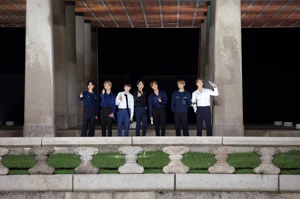 BTS poses at Gyeonghoeru Pavilion in Gyeongbokgung ahead of a performance of "Mikrokosmos" on "The Tonight Show Starring Jimmy Fallon" in 2020. (Big Hit Music)