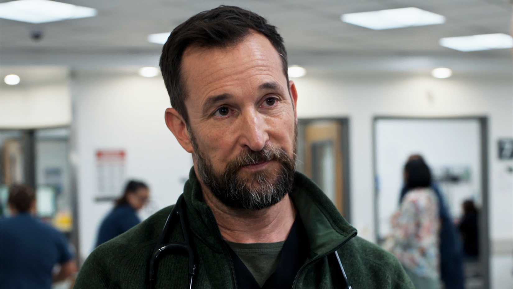 Robby talking to Langdon in a scene from The Pitt, and looking frustrated, in season 2