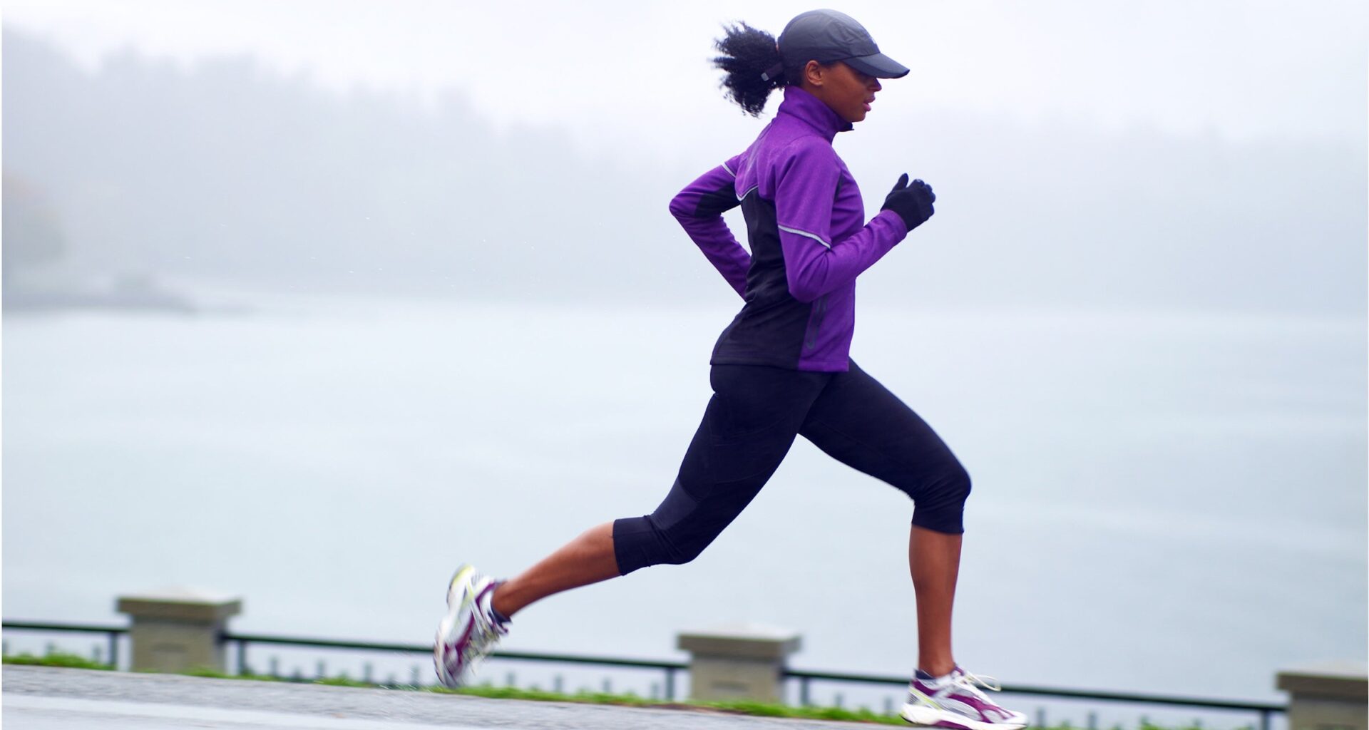 woman running in purple shirt