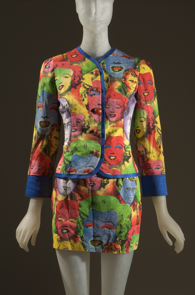 colorful jacket and skirt set featuring iconic face patterns