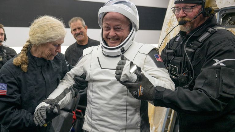 Astronaut Mike Fincke was helped out of a spacecraft after returning to Earth in January. Pic: Reuters