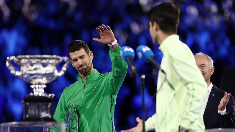 Djokovic goes to shake Alcaraz's hand after defeat. Pic: Reuters