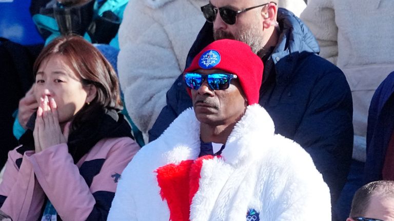 Snoop Dogg watched as the skier crashed. Pic: dpa/AP