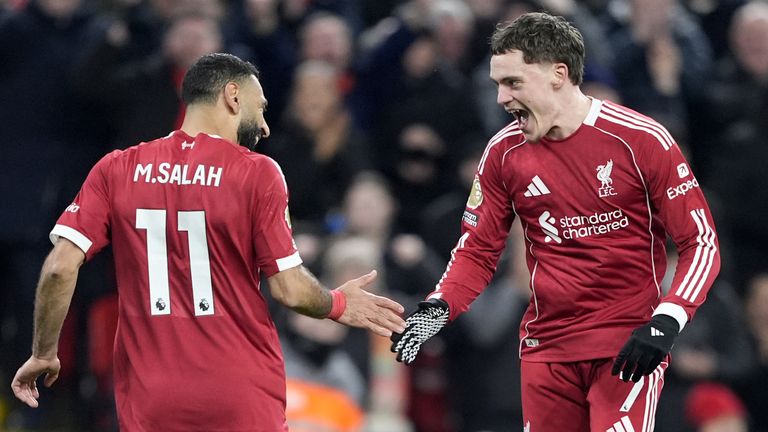 Goalscorer Florian Wirtz celebrates with team-mate Mohamed Salah