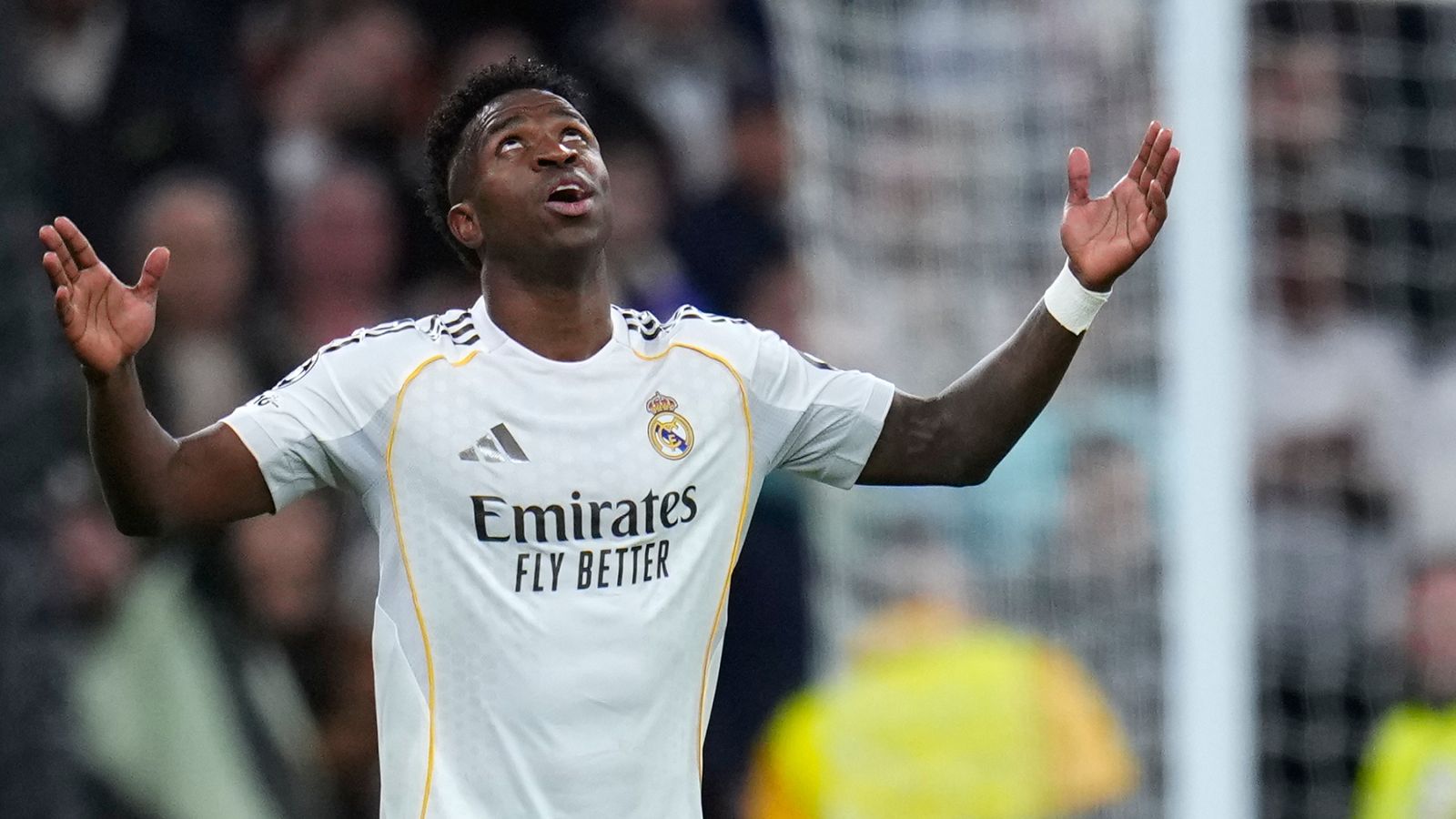 Real Madrid's Vinicius Junior celebrates after scoring his side's second goal during the second leg of the Champions League playoff soccer match between Real Madrid and Benfica in Madrid, Spain, Wednesday, Feb. 25, 2026. (AP Photo/Manu Fernandez)