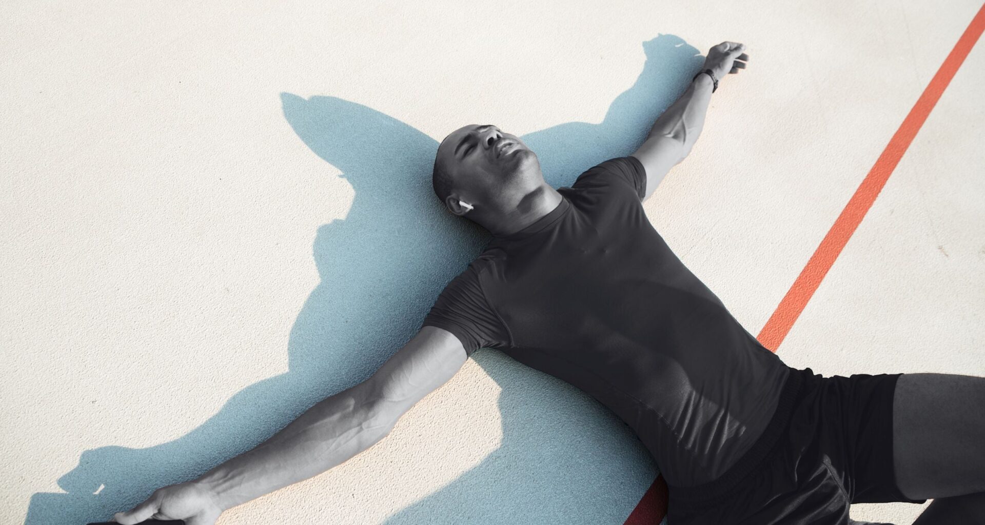 person on the floor tired after a workout