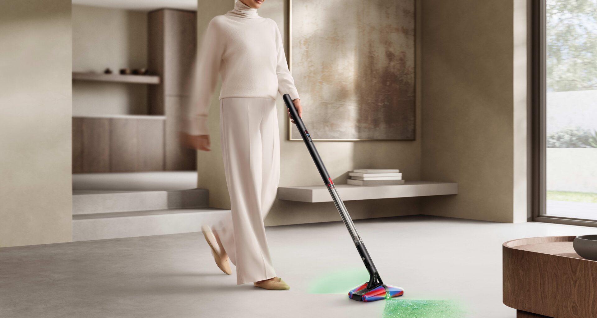 Woman using Dyson PencilVac