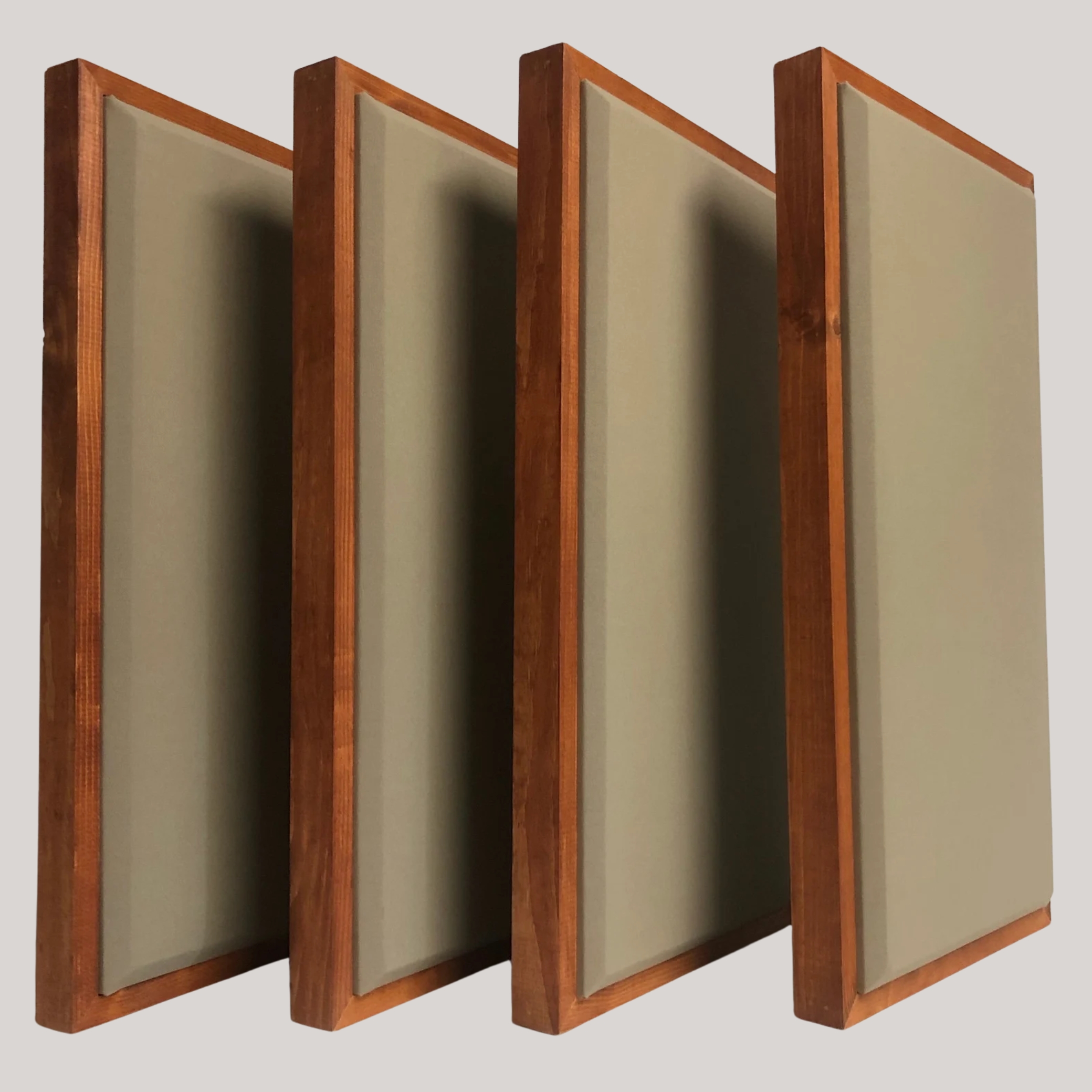 Four acoustic wooden panel upholstered with pale sage green fabric.