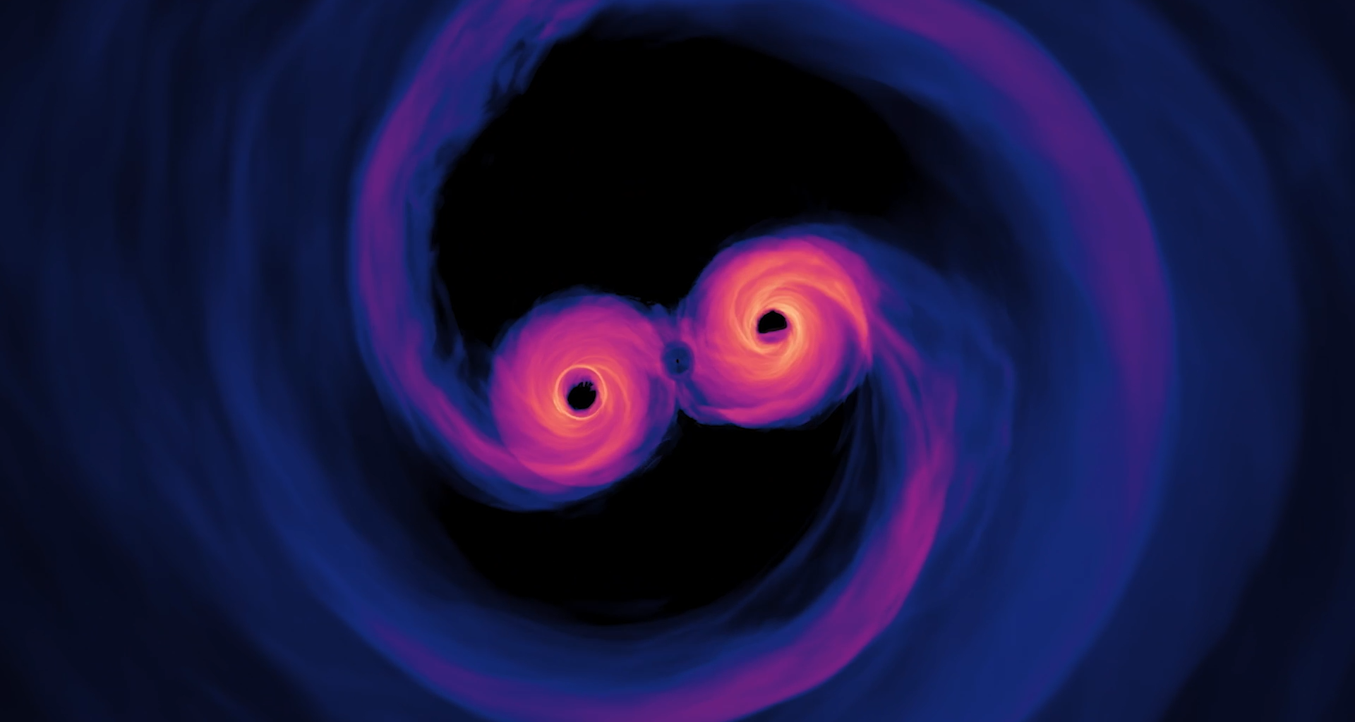 Computer simulation of shortly before a supermassive black hole merger. Credit - NASA’s Goddard Space Flight Center/Scott Noble; simulation data, d'Ascoli et al. 2018