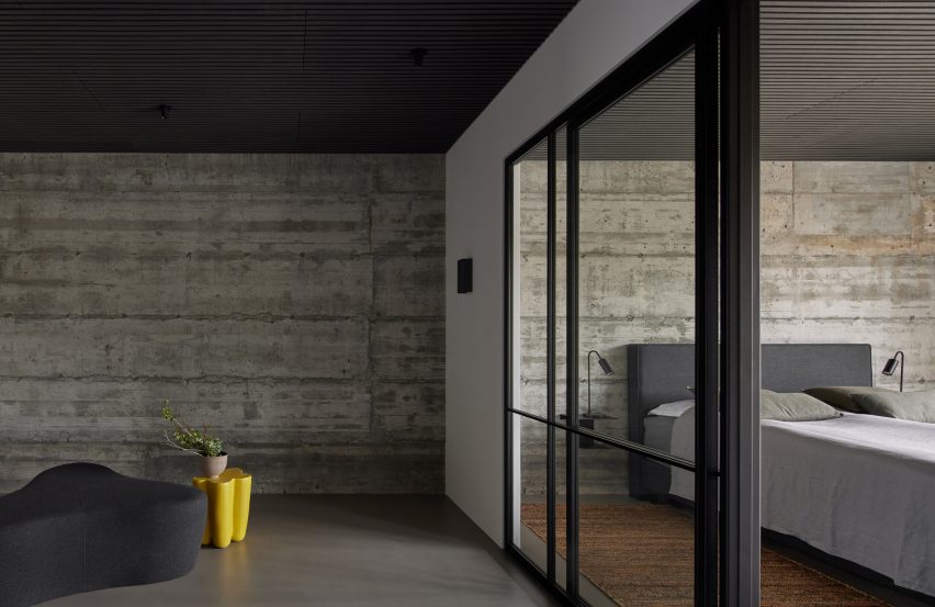 Concrete-lined bedroom