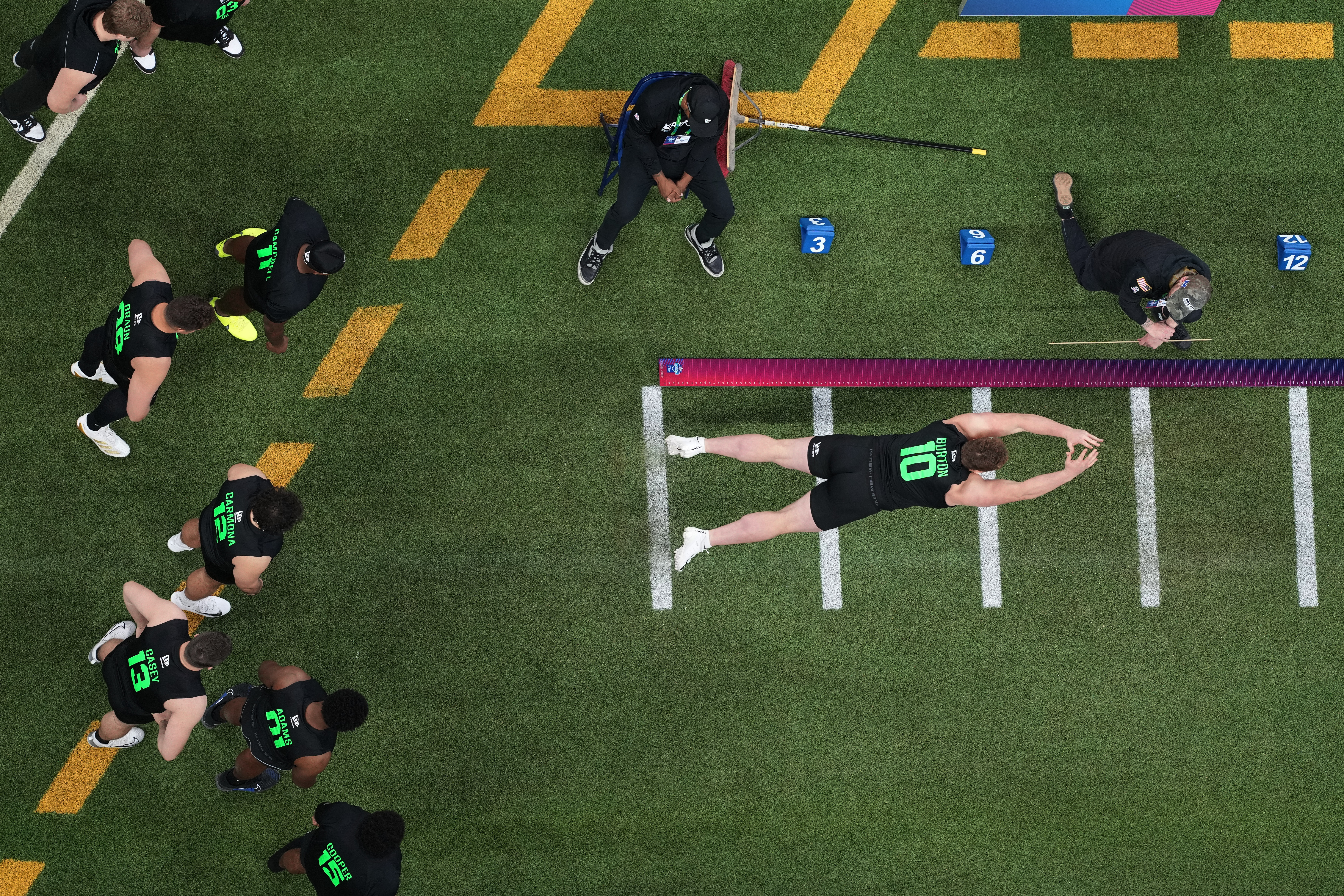 Jager Burton (10) performing a drill at the NFL football scouting combine.