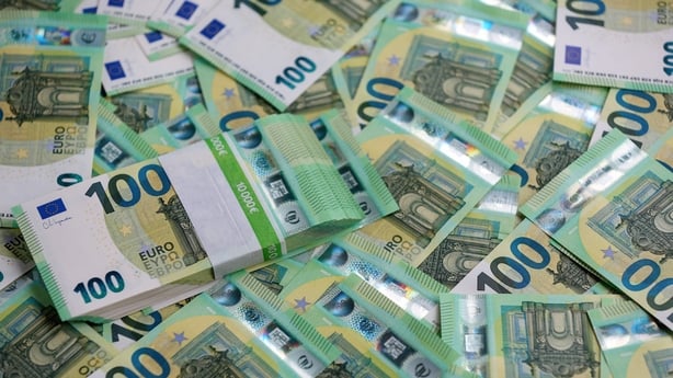 bundles of green 100 euro notes