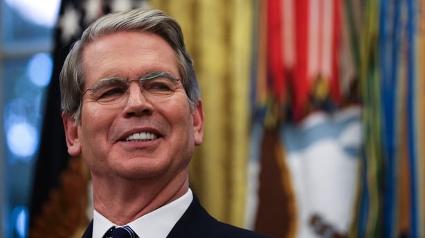 US Treasury Secretary Scott Bessent looks on during an event with US President Donald Trump in the Oval Office of the White House