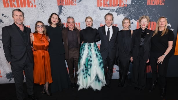 NEW YORK, NEW YORK - MARCH 3: (L-R) Christian Bale, Pam Abdy, Maggie Gyllenhaal, Mike De Luca, Jessie Buckley, Peter Sarsgaard, Julianne Hough, Annette Bening and Emma Tillinger Koskoff attend an event attends the U.S. premiere of Warner Bros. Pictures' "THE BRIDE!" at The Rose Theatre, Jazz at Linc