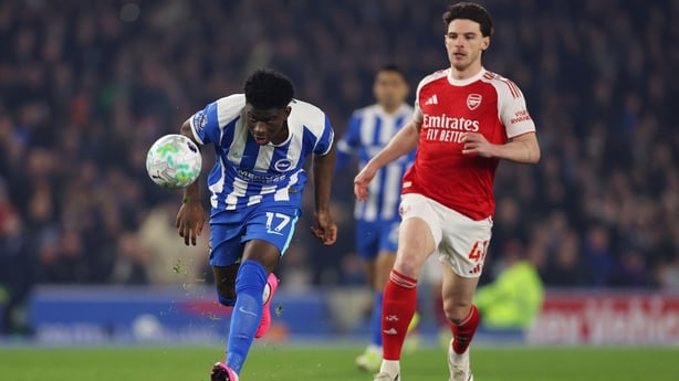 Carlos Baleba of Brighton & Hove Albion misses a chance whilst under pressure from Declan Rice of Arsenal during the Premier League match between Brighton & Hove Albion and Arsenal at Amex Stadium on March 04, 2026 in Brighton, England.