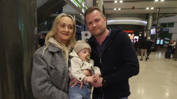 The Sieniawska family at the airport