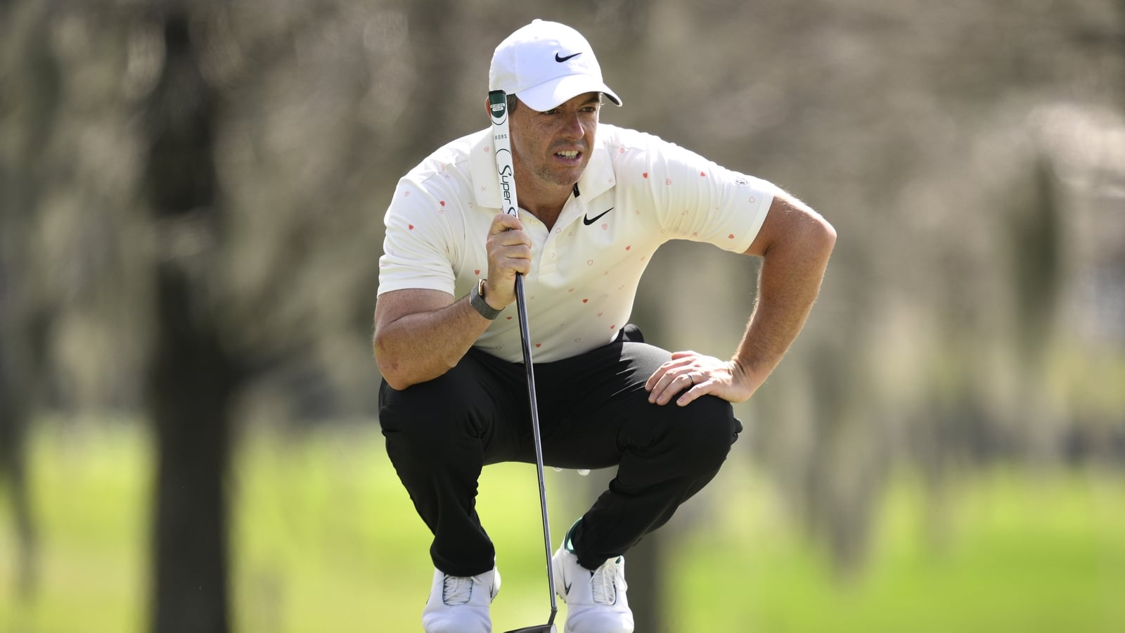 McIlroy moves to T9th, Lowry misses cut after late error