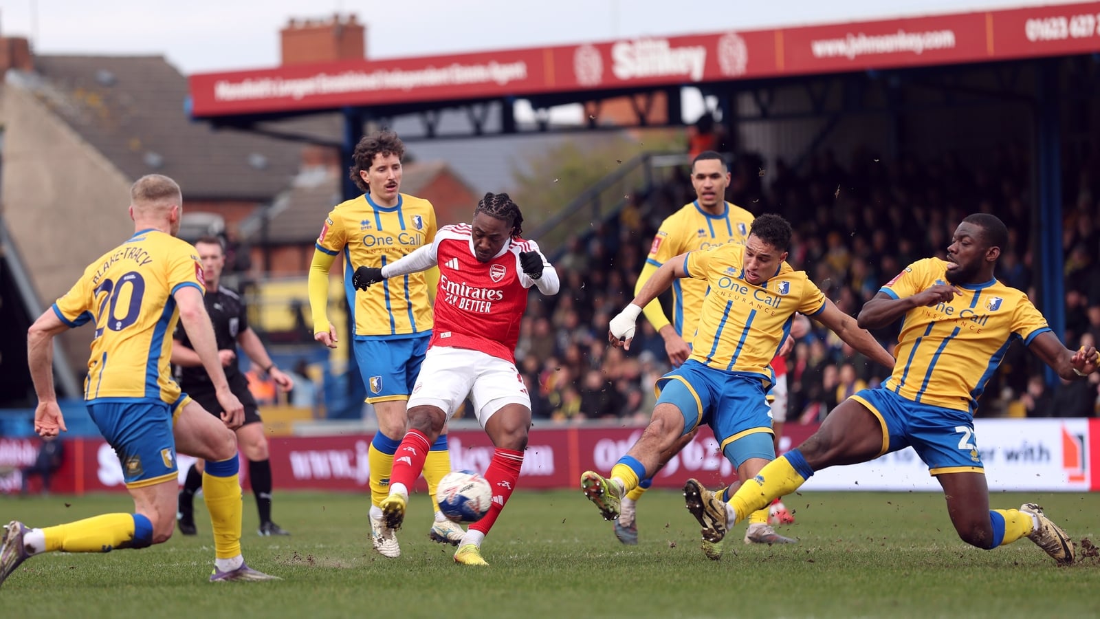 Arsenal's quadruple bid alive as they overcome Mansfield