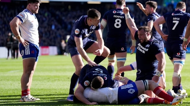 Scotland's Pierre Schoeman (right)