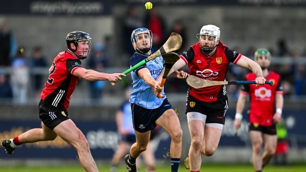 Dara Purcell of Dublin in action against Niall McFarland, left, and Barry Trainor of Down - Allianz Hurling League 2026