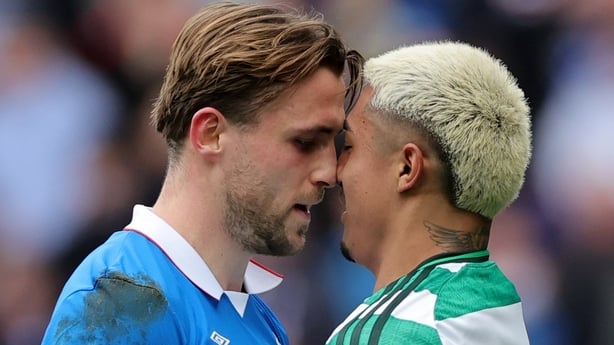 Rangers' Tuur Rommens (left) and Celtic's Julian Araujo clash