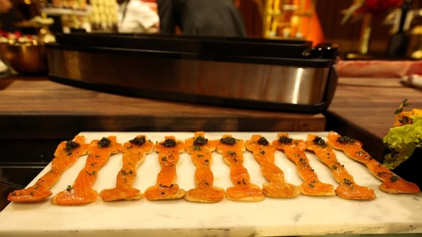 View of Oscar salmon toast during the 98th Oscars Governors Ball Preview at Ovation Hollywood Complex on 10 March, 2026 in Hollywood, California. (Photo by VALERIE MACON / AFP)