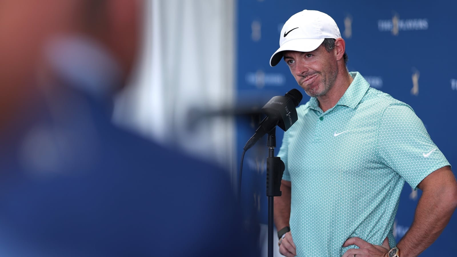 McIlroy taking it 'hour by hour' amid back complaint