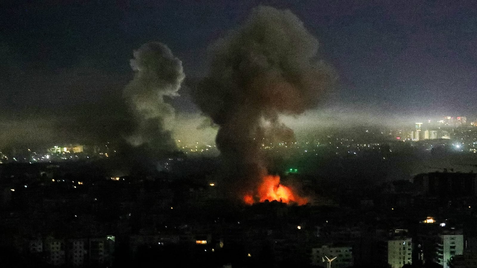 Tankers burn near Iraq, Iran strikes defy Trump's claims