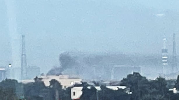 Smoke rises following a drone attack on the US embassy in Baghdad on March 14, 2026. A drone struck the US embassy in Baghdad on March 14, an Iraqi security official said, as an AFP journalist saw smoke rising from the complex