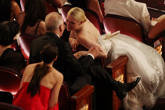 Hollywood, CA - March 15, 2026: Elle Fanning talks with Stellan Skarsgard during the 98th Annual Academy Awards held by the Academy of Motion Picture Arts and Sciences at the Dolby Theatre in Hollywood, CA, Sunday, March 15, 2026. (Robert Gauthier / Los A