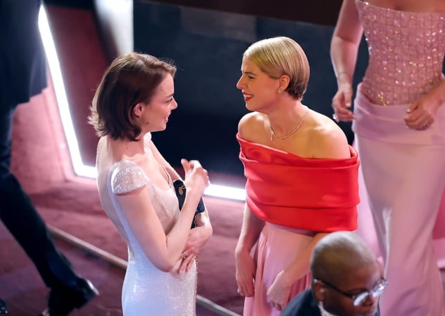 HOLLYWOOD, CALIFORNIA - MARCH 15: (L-R) Emma Stone and Jessie Buckley attend the 98th Oscars at Dolby Theatre on March 15, 2026 in Hollywood, California. (Photo by Kevin Winter/Getty Images)