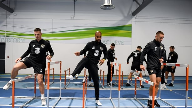 Republic of Ireland players, from left, Ciaran Clark, David McGoldrick and Conor Hourihane during a gym session prior to a Republic of Ireland training session at the FAI National Training Centre in Abbotstown, Dublin.