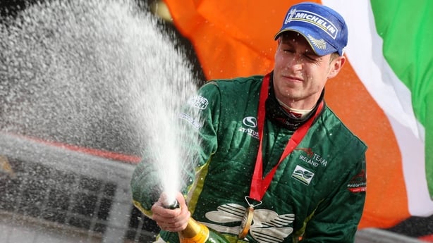3 May 2009; Ireland�s Adam Carroll celebrates on the podium after winning the A1GP Brands Hatch Feature race and the A1GP World Cup of Motorsport Championship. A1GP Final Round, Brand�s Hatch, Fawkham, Longfield, Kent, England. Picture credit; A1GP.com / SPORTSFILE