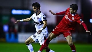 Connor Parsons of Bohemians in action against Sean Gannon of Shelbourne, Premier Division, March 2026