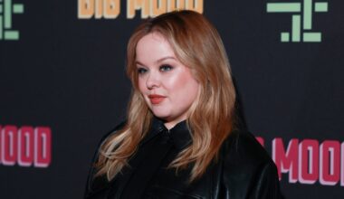 Nicola Coughlan channels 80s glam in leather mini dress