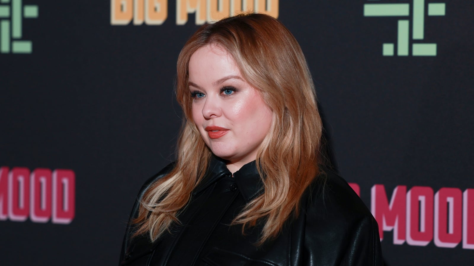 Nicola Coughlan channels 80s glam in leather mini dress