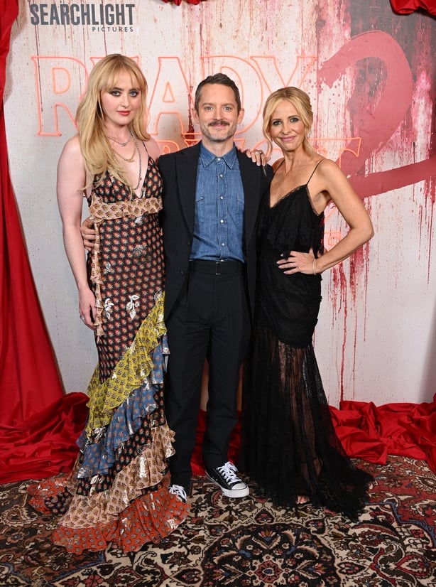 AUSTIN, TEXAS - MARCH 13: (L-R) Kathryn Newton, Elijah Wood and Sarah Michelle Gellar attend