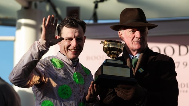 13 March 2026: Jockey Paul Townend celebrates with the trophy alongside winning trainer Willie Mullins after victory in the Boodles Cheltenham Gold Cup Chase with Gaelic Warrior on day four of the 2026 Cheltenham Racing Festival at Prestbury Park in Cheltenham, England. Photo by Harry Murphy/Sportsf
