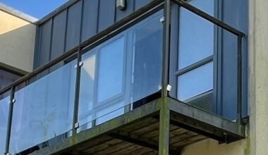 Two children hospitalised after falling from balcony