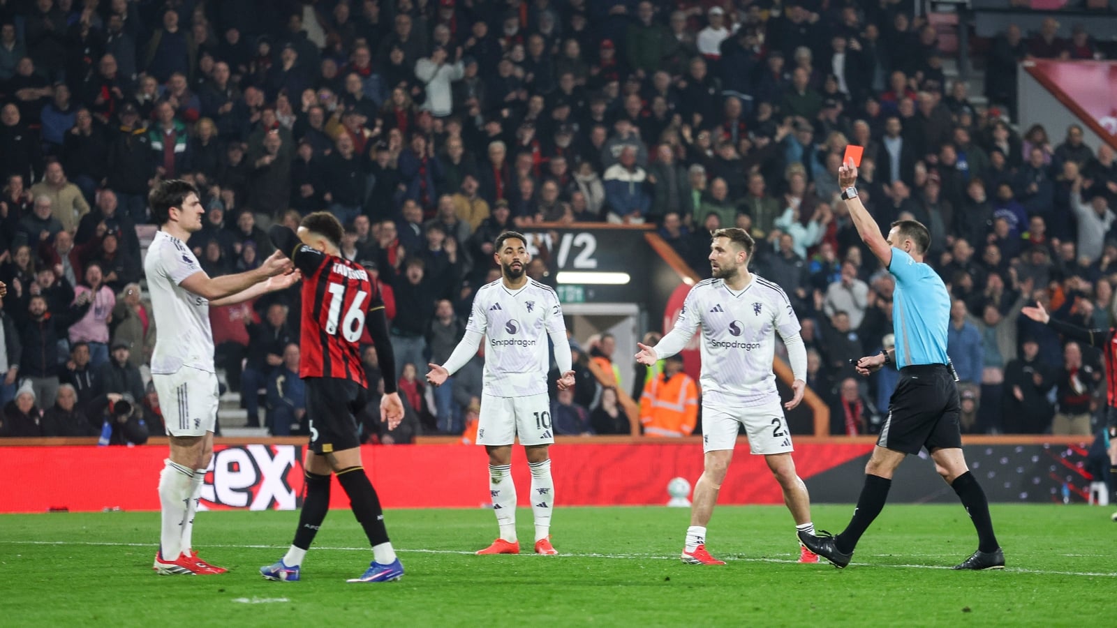 United's Maguire sees red in lively draw with Bournemouth