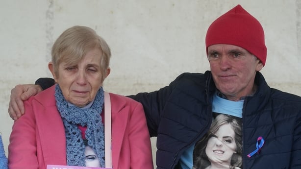 Murder victim Natalie McNally parents, mother Bernie and father Noel, join people at a vigil at Lurgan Park in Lurgan, Co Armagh in memory of their daughter and opposing violence against women.