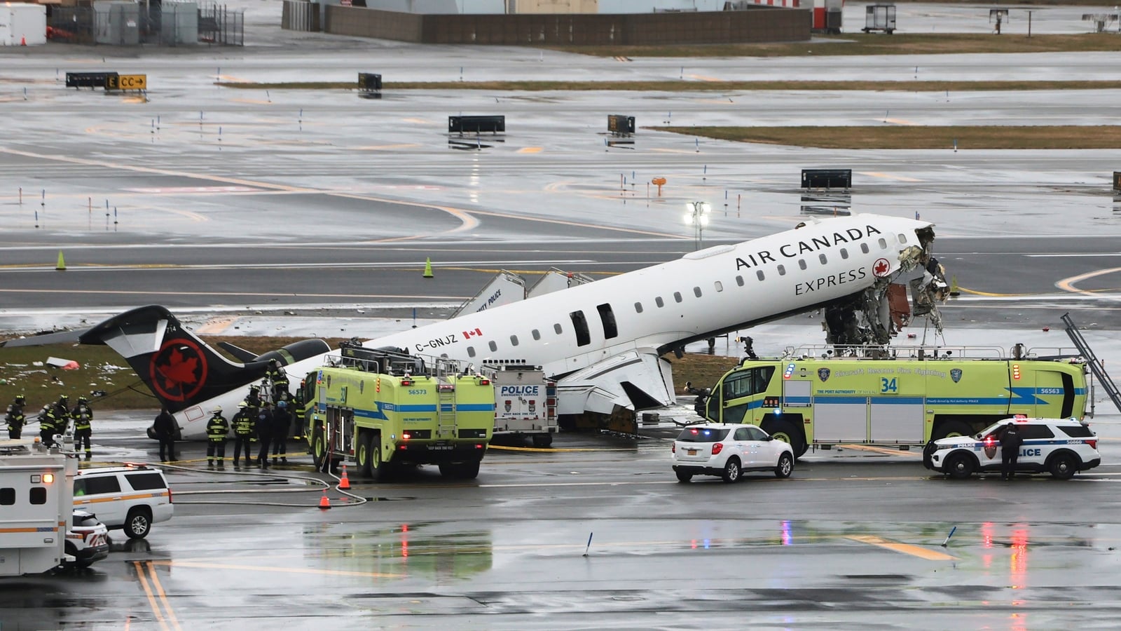 Two pilots killed after plane hits vehicle at NY airport