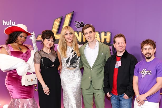 LOS ANGELES, CALIFORNIA - MARCH 23: (L-R) Shanica Knowles, Anna Maria Perez de Tagle, Miley Cyrus, Cody Linley, Jason Earles and Moisés Arias attend the World Premiere of Disney+'s "Hannah Montana 20th Anniversary Special" at El Capitan Theatre on March 23, 2026 in Los Angeles, California. (Photo by