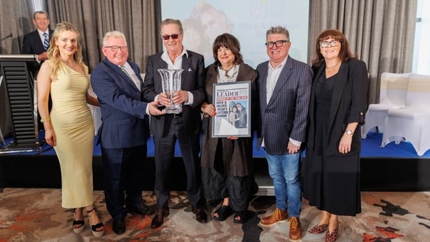 Mick and Valerie Dolan with their award.