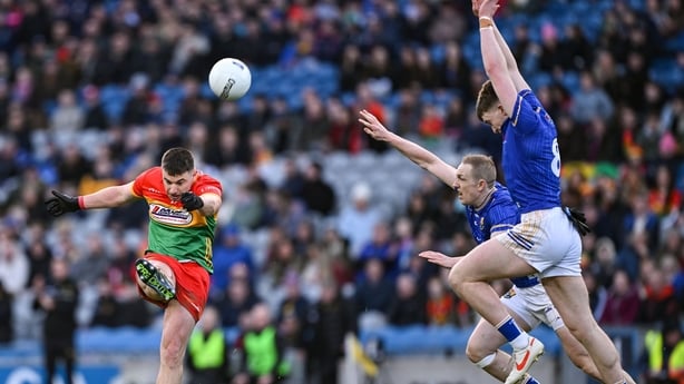 Colm Hulton kicks a first-half point for Carlow