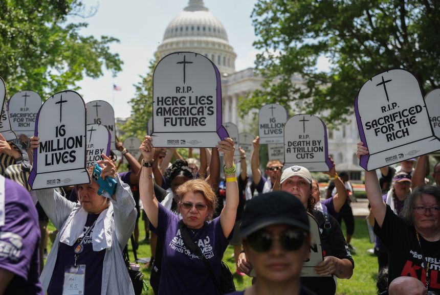 Workers from Service Employees International Union protest proposed Medicaid cuts near the US Capitol building last June.