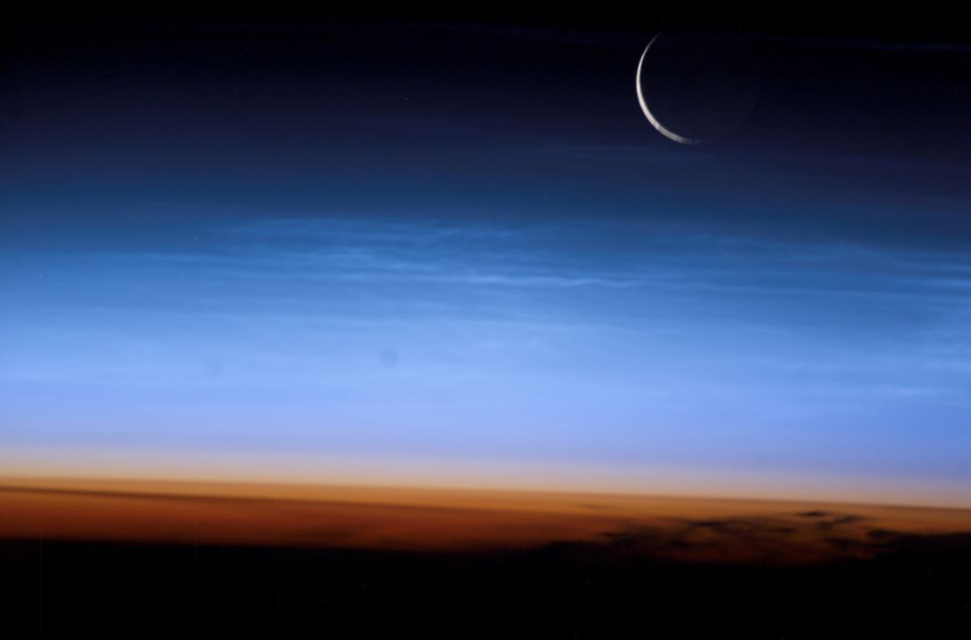This image, taken from the International Space Station, shows the limb of Earth beneath the orange-colored stratosphere, the lowest and most dense portion of the Earth's atmosphere.