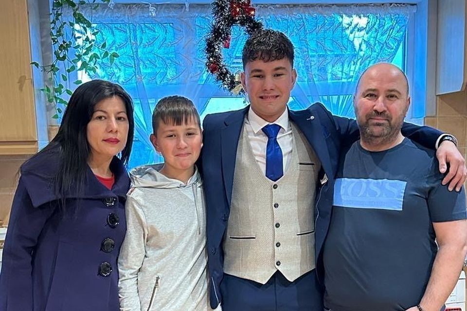 Fatmir Mucaj (right) with his sons, Ben and Orgito, and late wife, Anila.